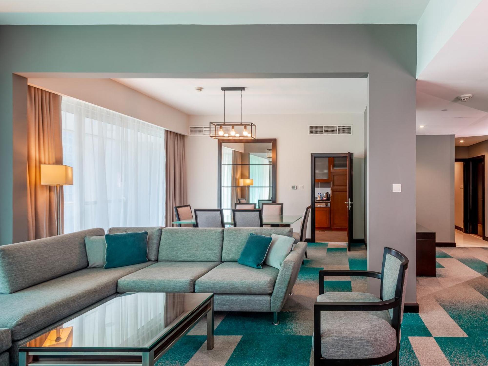 Two-Bedroom Apartment Kitchen & Balcony – Monthly